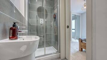 Shower, hair dryer, shampoo