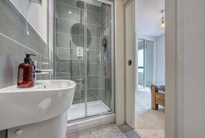 Shower, hair dryer, shampoo