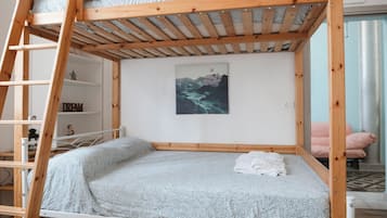 Deluxe Studio Suite | Down comforters, memory foam beds, desk, soundproofing