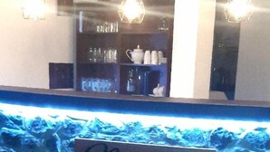 A reception area with a stone counter and a sign that reads "Namaste." - Namaste Nilaveli (Nilaveli)