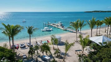 On the beach, sun loungers, beach towels