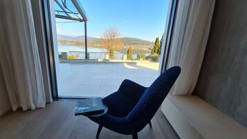 Exclusive Suite, 3 Bedrooms, Non Smoking | Living area | 120-cm flat-screen TV with cable channels, TV