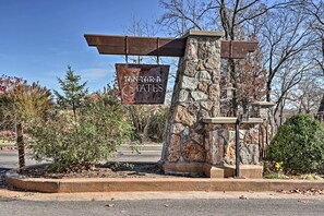 Welcome to Tantra & Estates, a serene entrance to a beautifully landscaped area.