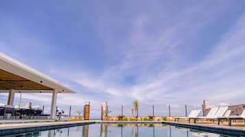 Outdoor pool, open 11:00 AM to 6:30 PM, pool umbrellas, sun loungers