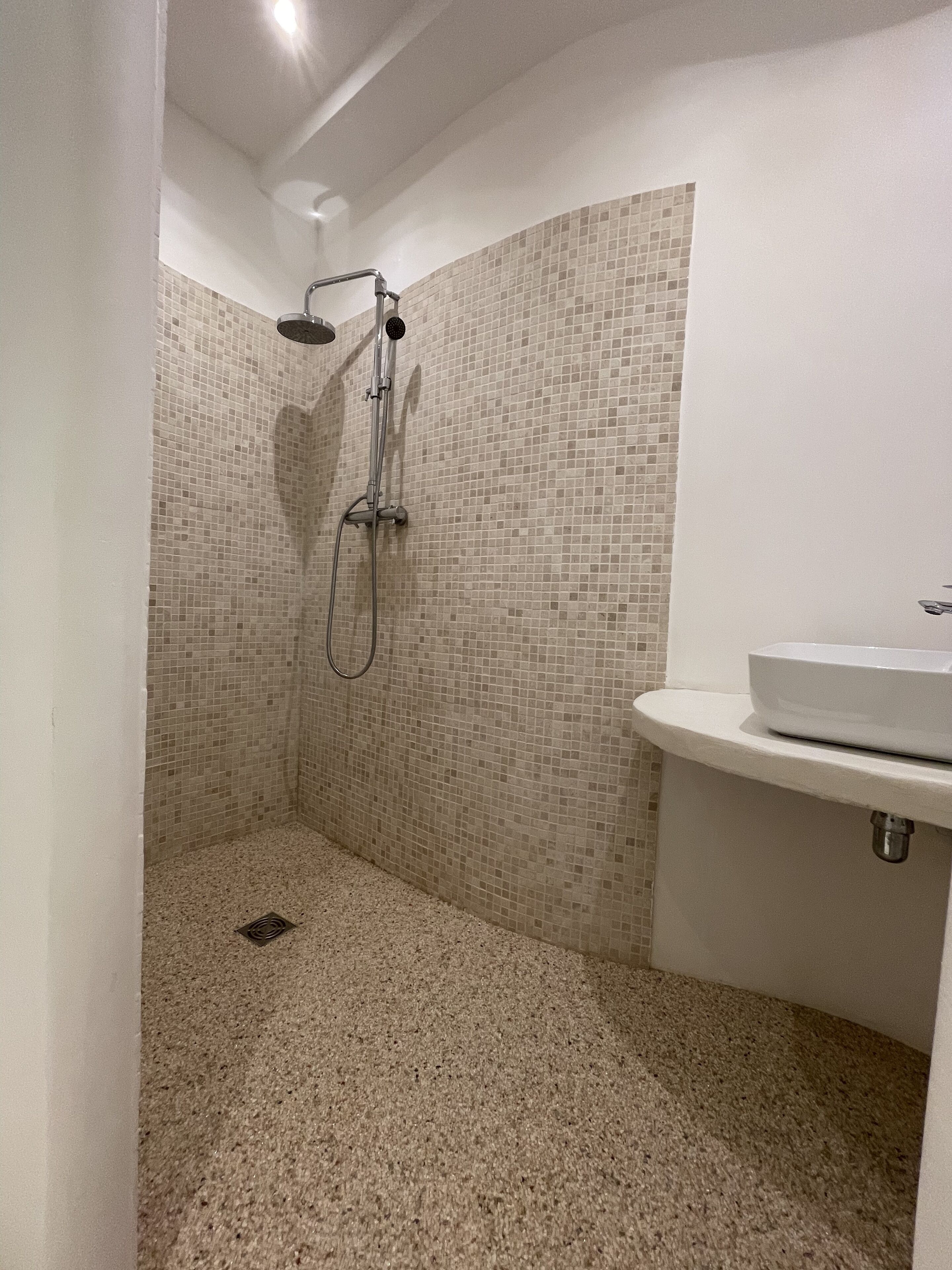 Shower, hair dryer, towels, toilet paper