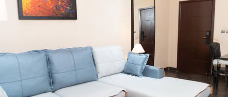 Signature Suite, 1 King Bed, City View, Executive Level | Living area | 65-inch Smart TV with digital channels