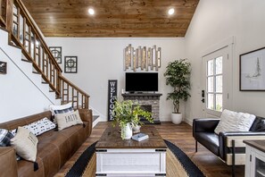 Smart TV, fireplace, books