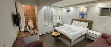 Economy Double Room | Premium bedding, minibar, individually decorated, desk