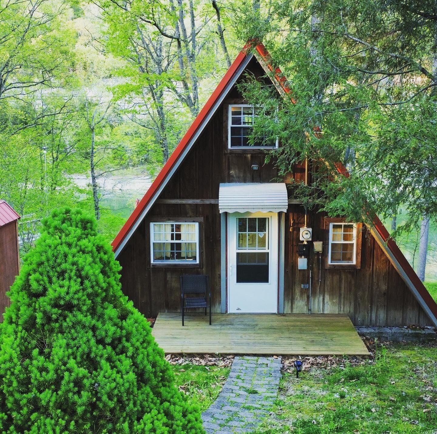 Lakefront A-frame: rare private dock, rock wall views, short walk to boat ramp