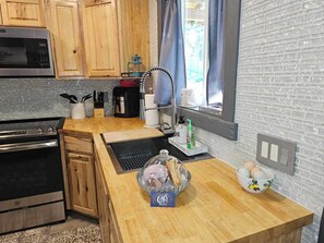 Frigorífic gran, microones, forn i placa de cuina