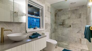 Shower, hair dryer, towels, soap