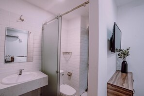 Standard Room | Bathroom | Hair dryer, slippers, towels, soap