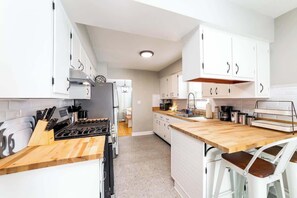 Fridge, microwave, oven, stovetop - Simple & Sweet 2 BR 1 BA Home in Lansing - Cynwood (Lansing)