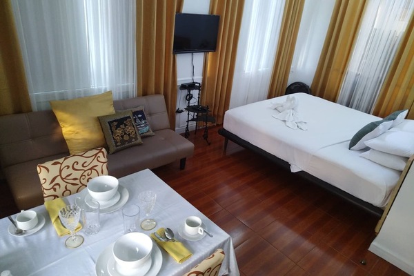 Family Room | Premium bedding, down comforters, pillowtop beds, in-room safe