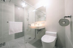 Standard Double Room | Bathroom | Shower, hair dryer, slippers, towels - From H T Resort Jeju Seongsan (Seogwipo)