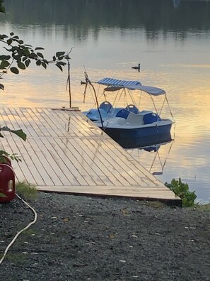Moored at the dock, a small boat awaits your next adventure.