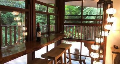 Romantic rainforest retreat with magical waterfall