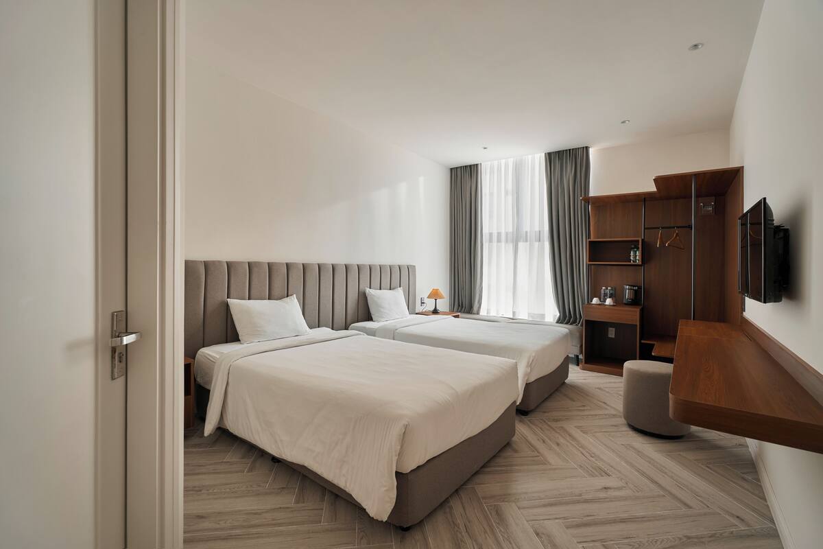 Chambre Deluxe avec lits jumeaux | Mini-bar avec articles gratuits, Wi-Fi gratuit, draps fournis