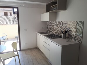 Private kitchen - House of Magda studio apartment with terrace (Castellammare del Golfo)