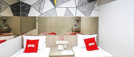 Habitación Deluxe con 2 camas individuales | Escritorio, espacio para trabajar con laptop y wifi gratis