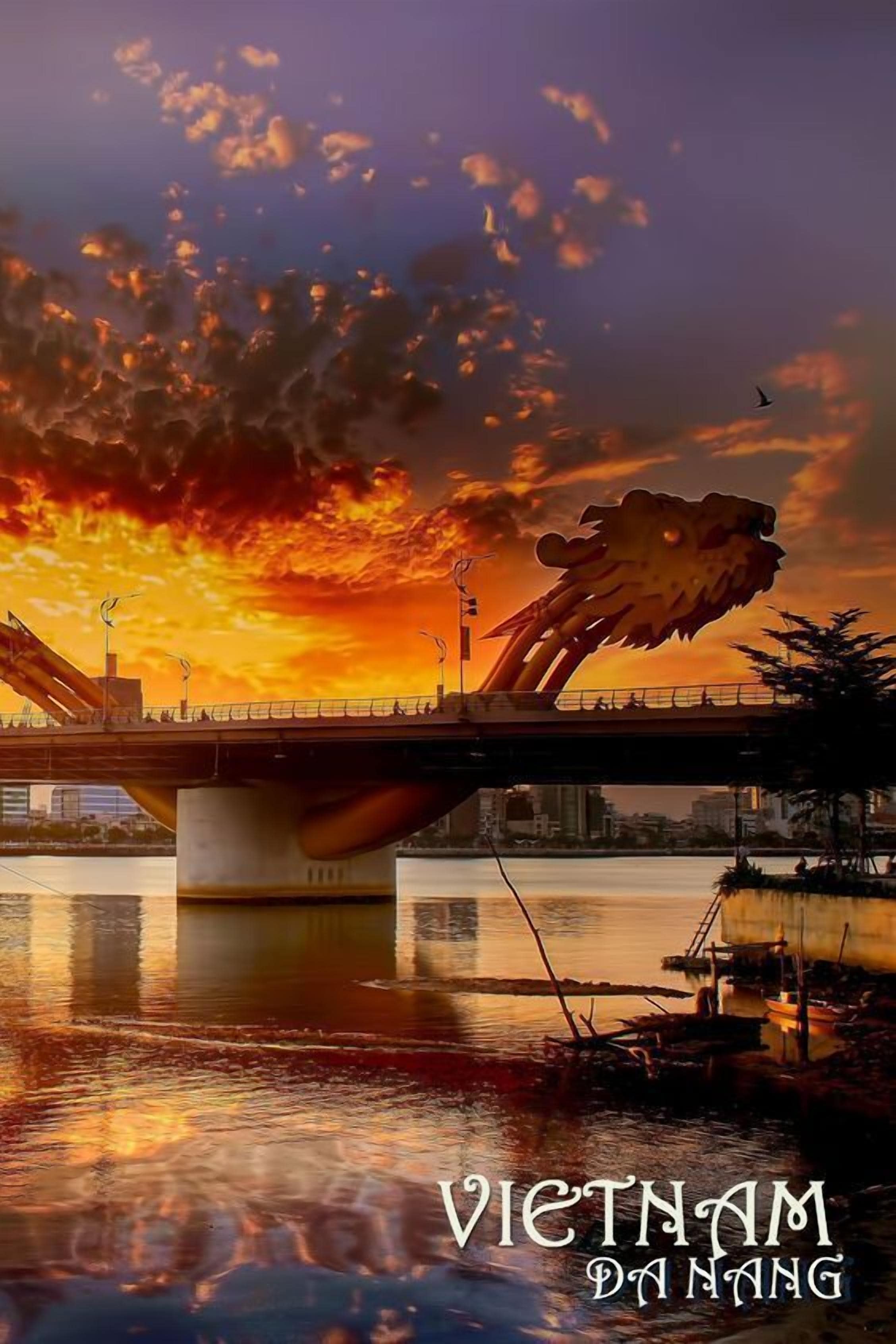 A sunset over a bridge with a dragon sculpture, water below, and the text "VIETNAM DANG" visible.