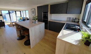 Fridge, microwave, oven, stovetop - Modern open plan house, sea views and hot tub (Falmouth)