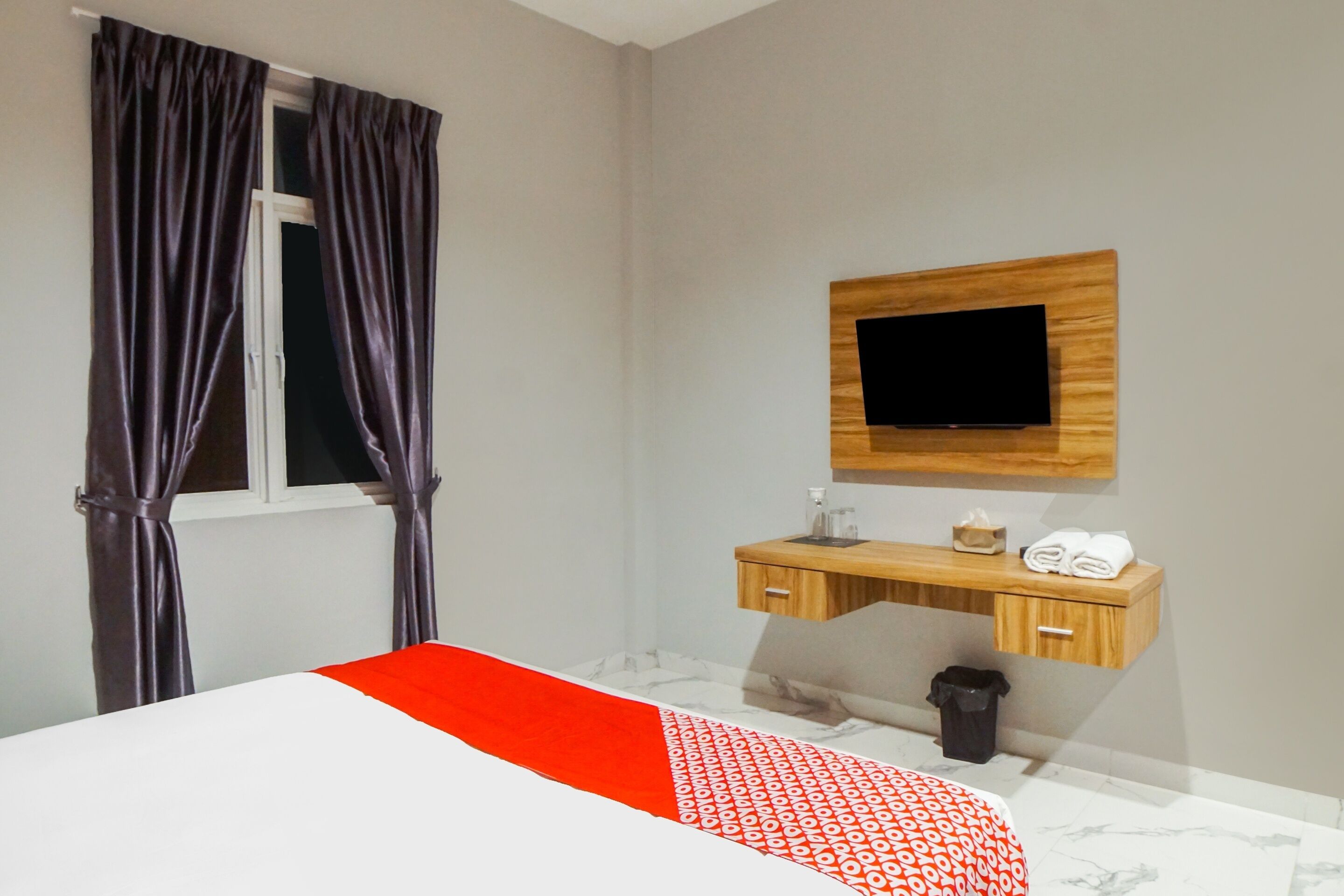 Foto - SUPER OYO Capital O 92066 Papakoel Hotel & Cafe