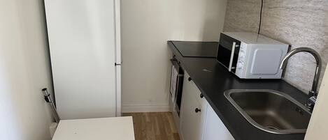Apartment | Private kitchen | Fridge, microwave, oven, stovetop