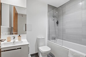 Hair dryer, towels, soap, shampoo
