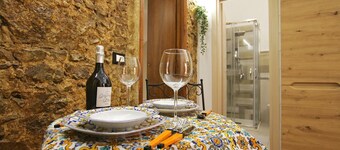 2 bedrooms flat, patio, 2 minutes walk from the centre, free public parking