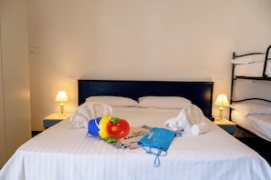 Neljän hengen comfort-huone | Tallelokero huoneessa