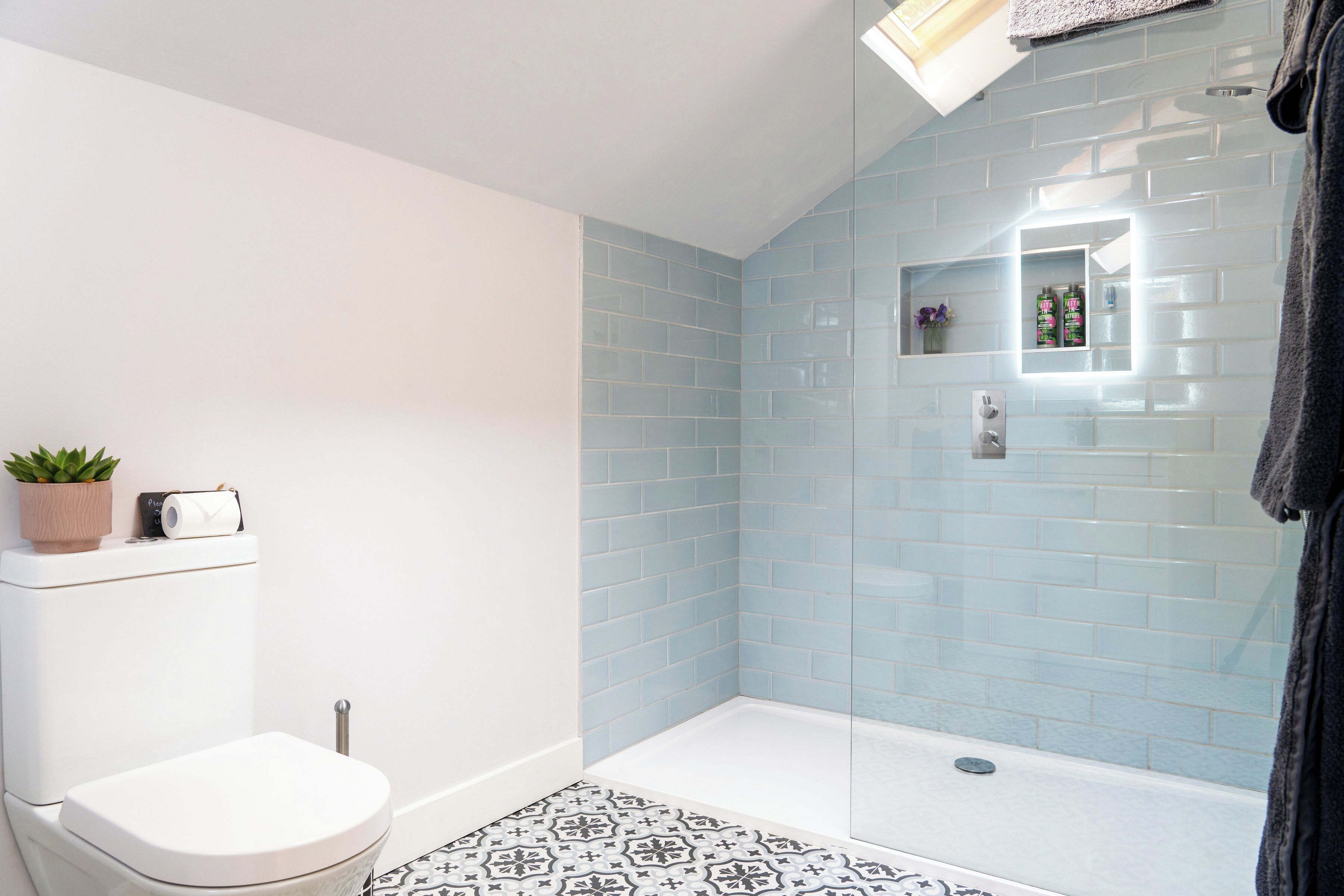 Shower, eco-friendly toiletries, hair dryer, towels