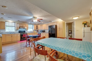 Enjoy cooking in this well-equipped kitchen with an oven, microwave, and refrigerator.