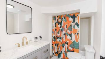 Bathtub, hair dryer, towels