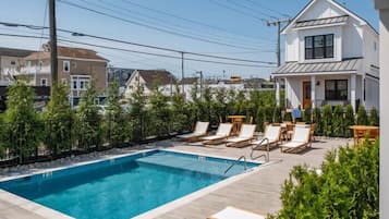 Seasonal outdoor pool, pool umbrellas, sun loungers