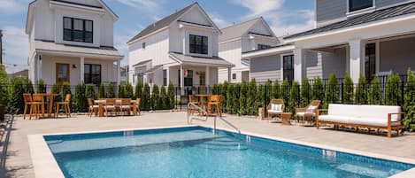 Seasonal outdoor pool, pool umbrellas, pool loungers