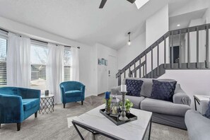 TV, fireplace - Spacious Olathe Home: Pool Table, WiFi & Theatre (Olathe)