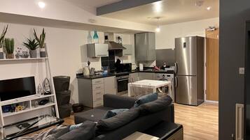 Estúdio, 1 cama Queen | Área de estar