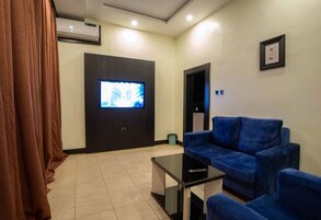 Royal Suite | Living area | 6-inch plasma TV with cable channels