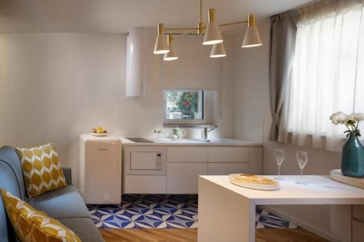 Superior Condo, 2 Bedrooms, Ground Floor | Living area | 50-inch Smart TV with satellite channels