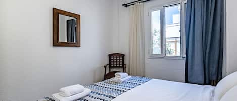 Suite familiar | Minibar, cortinas opacas, cunas gratuitas y wifi gratis