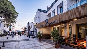 A modern building with a sign reading 'Costa Niva Bodrum.' - Costa Viva Bodrum (Bodrum)