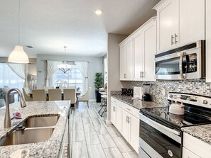 Fridge, coffee/tea maker, toaster, high chair