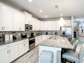 Fridge, coffee/tea maker, toaster, high chair