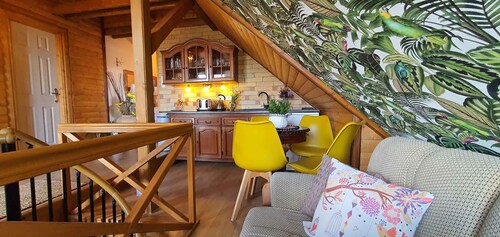 Holiday home in a picturesque landscape with a view and garden kitchen, wooden barrel with whirlpool and sauna