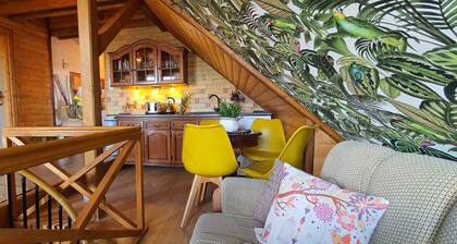 Holiday home in a picturesque landscape with a view and garden kitchen, wooden barrel with whirlpool and sauna