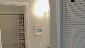 A bathroom with a shower, toilet, and sink. - #106-Condo nearby pool and the Gorge shuttle stop (Quincy)