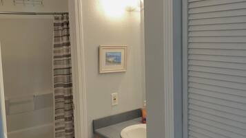 Shower, towels, soap, toilet paper