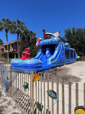 Enjoy a fun-filled day at our resort with a thrilling water slide and scenic views.