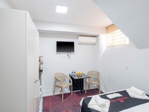 Economy Room | Premium bedding, desk, laptop workspace, soundproofing - The Red Tent Loft Suites (Istanbul)